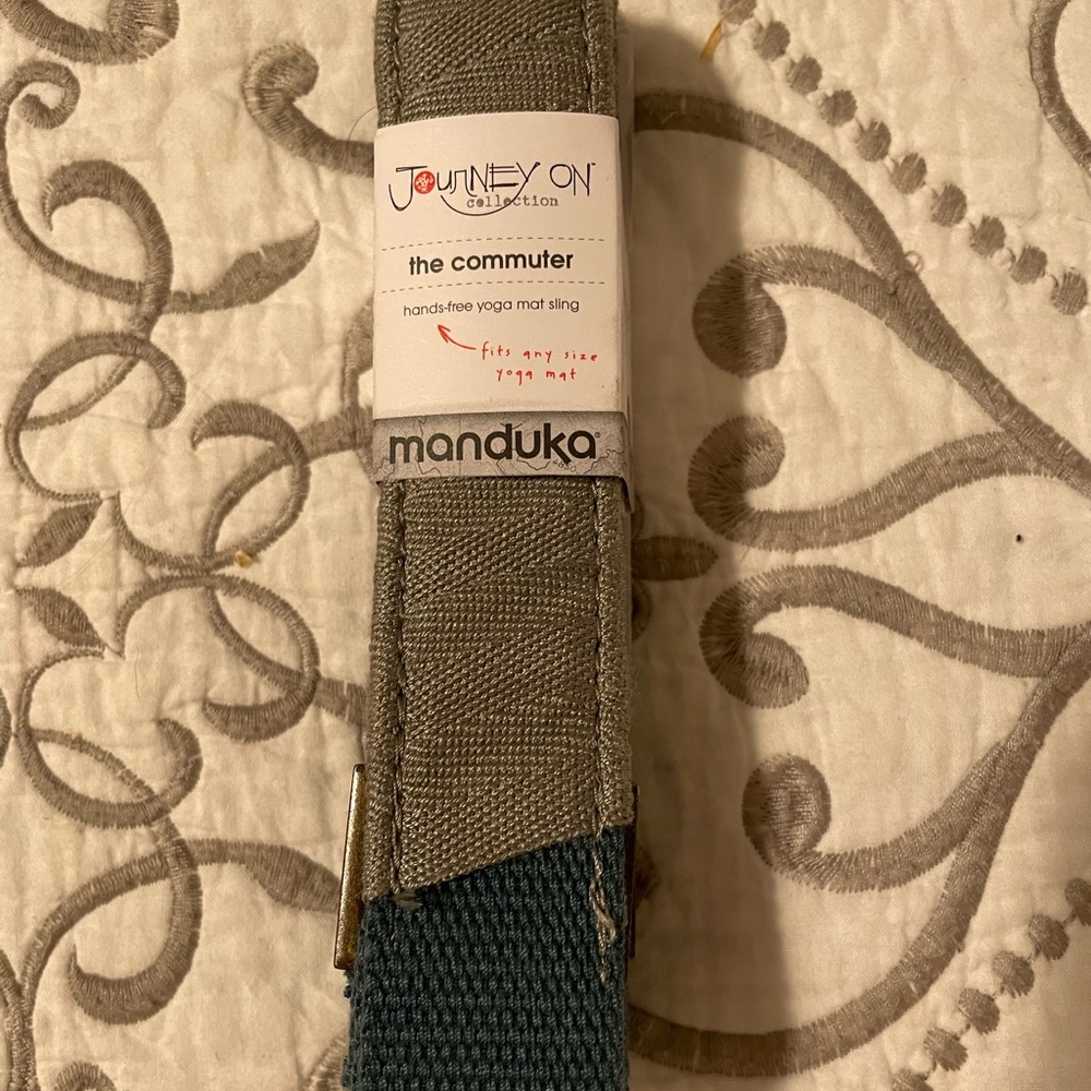 Yoga strap for carrying a mat